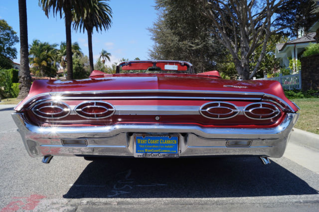 1962 Garnet Mist Metallic Oldsmobile Starfire Convertible