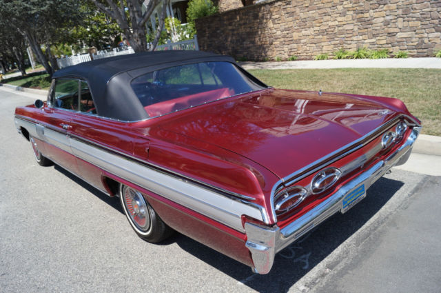 1962 Garnet Mist Metallic Oldsmobile Starfire Convertible