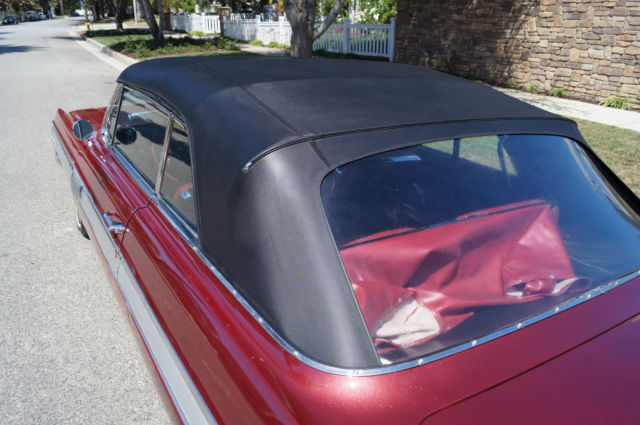 1962 Garnet Mist Metallic Oldsmobile Starfire Convertible
