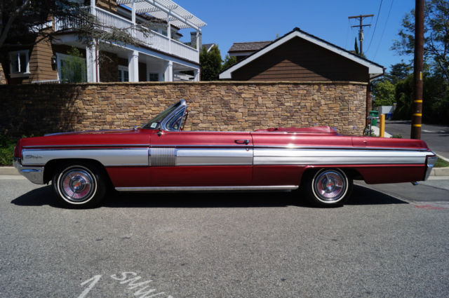 1962 Garnet Mist Metallic Oldsmobile Starfire Convertible