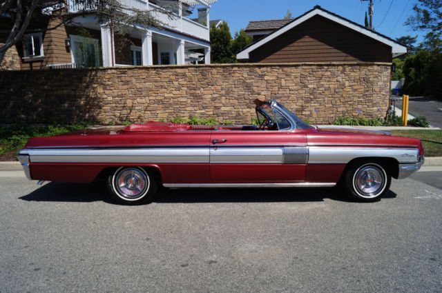 1962 Garnet Mist Metallic Oldsmobile Starfire Convertible