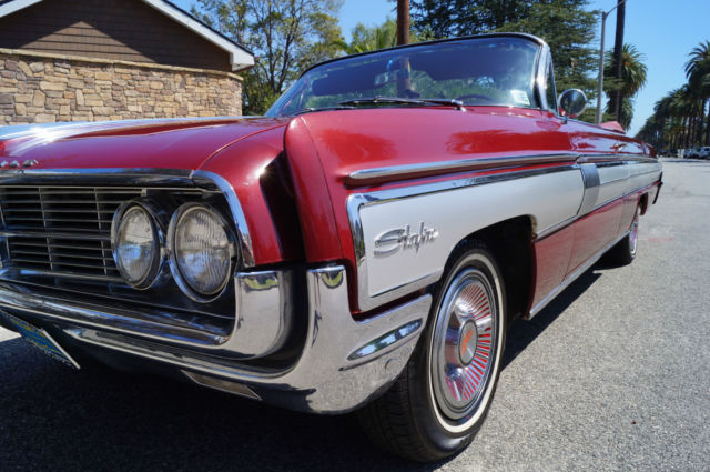 1962 Garnet Mist Metallic Oldsmobile Starfire Convertible