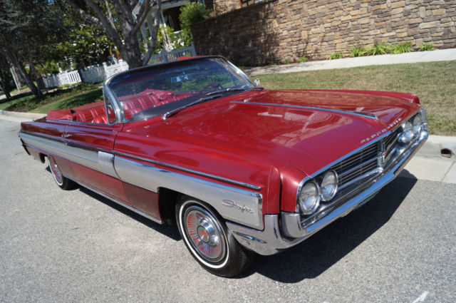 1962 Garnet Mist Metallic Oldsmobile Starfire Convertible