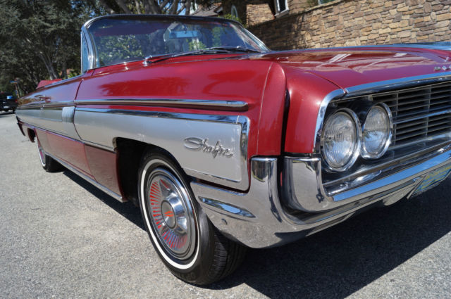 1962 Garnet Mist Metallic Oldsmobile Starfire Convertible