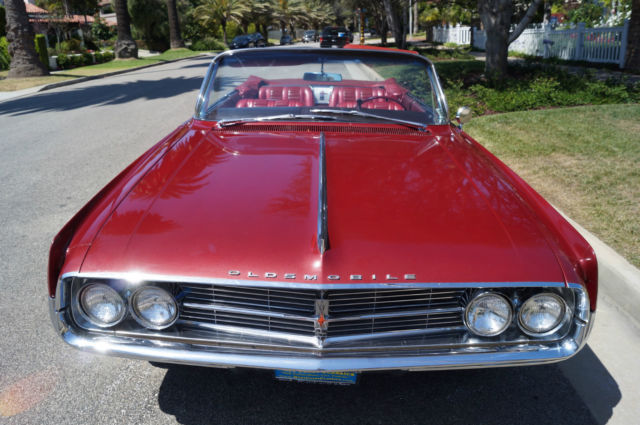 1962 Garnet Mist Metallic Oldsmobile Starfire Convertible