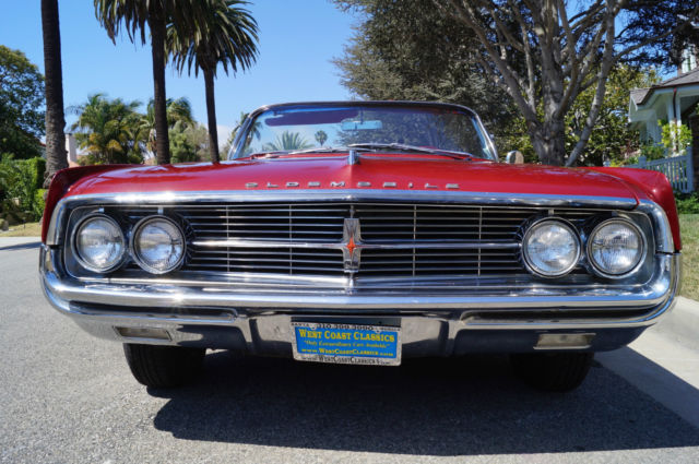 1962 Garnet Mist Metallic Oldsmobile Starfire Convertible