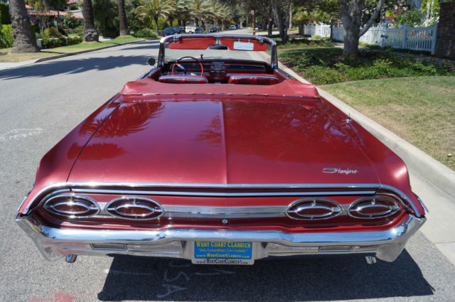 1962 Garnet Mist Metallic Oldsmobile Starfire Convertible