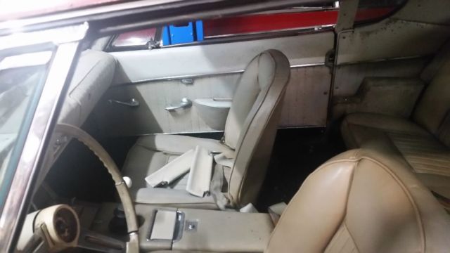 1963 Maroon Studebaker Avanti Coupe