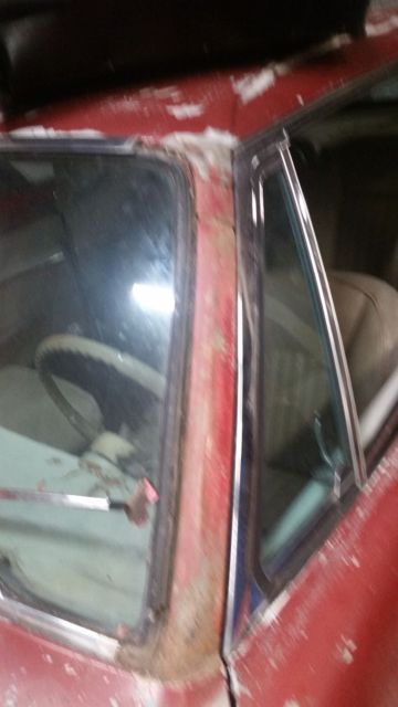 1963 Maroon Studebaker Avanti Coupe