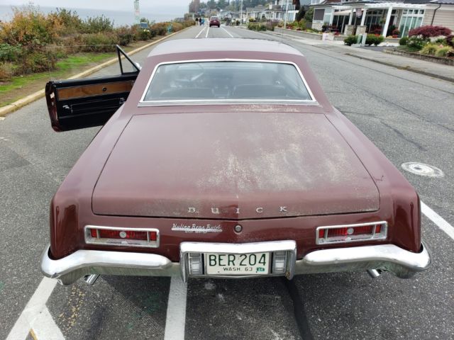 1963 Burgundy Buick Riviera Coupe