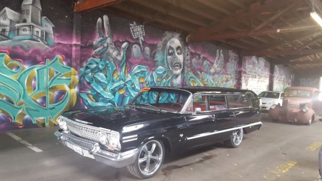1963 black Chevrolet Impala wagon