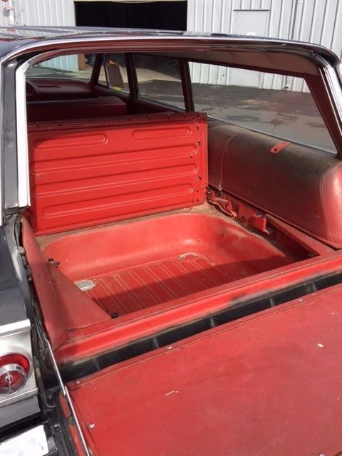 1963 black Chevrolet Impala wagon