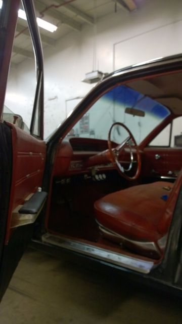 1963 black Chevrolet Impala wagon