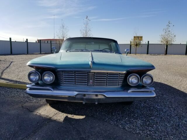 1963 Teal Chrysler Imperial Coupe