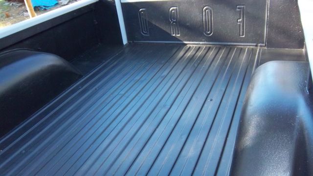 1963 primer gray Ford F-100 Pickup