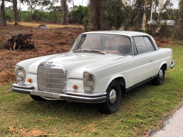 1963 White Mercedes-Benz 200-Series Coupe
