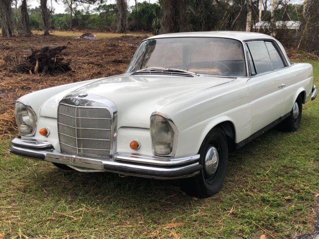 1963 White Mercedes-Benz 200-Series Coupe