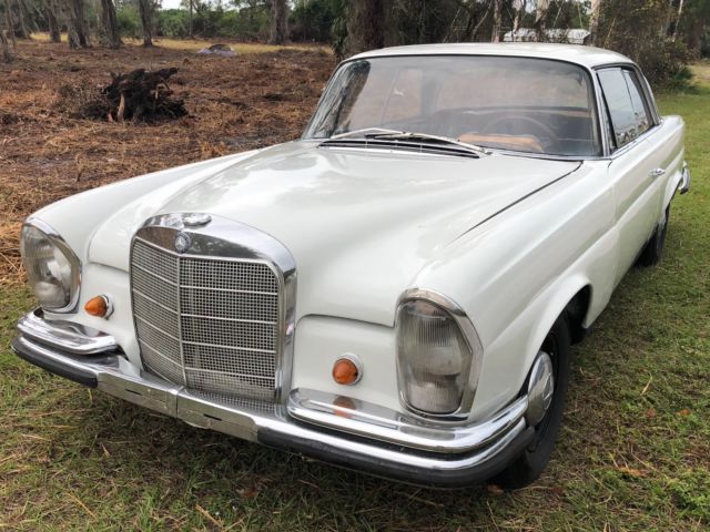 1963 White Mercedes-Benz 200-Series Coupe