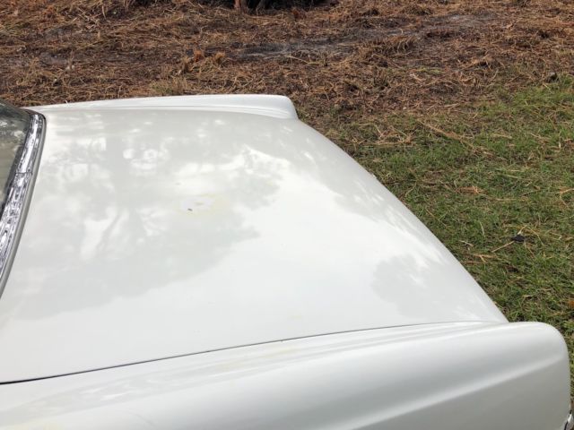 1963 White Mercedes-Benz 200-Series Coupe