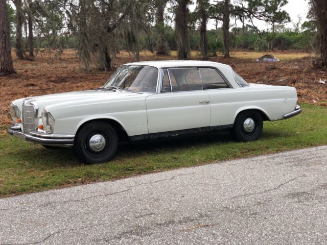 1963 White Mercedes-Benz 200-Series Coupe
