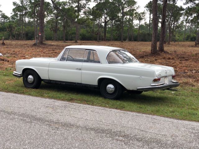 1963 White Mercedes-Benz 200-Series Coupe