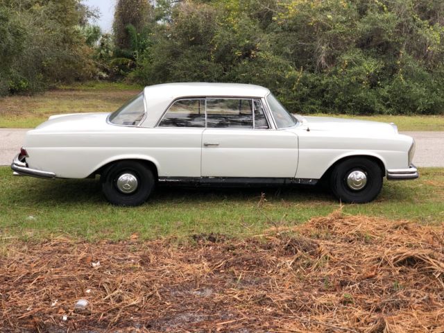 1963 White Mercedes-Benz 200-Series Coupe