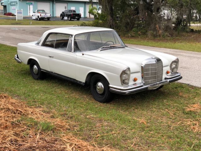 1963 White Mercedes-Benz 200-Series Coupe