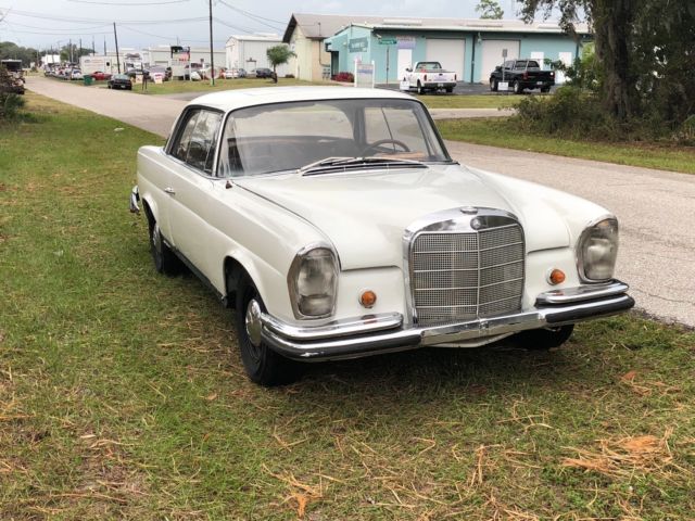 1963 White Mercedes-Benz 200-Series Coupe