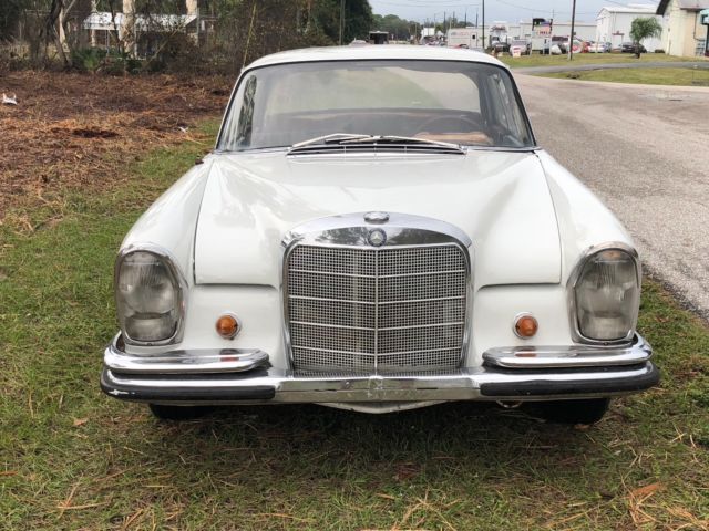 1963 White Mercedes-Benz 200-Series Coupe