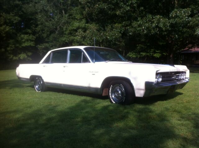 1963 off white / cream Oldsmobile Ninety-Eight Sedan