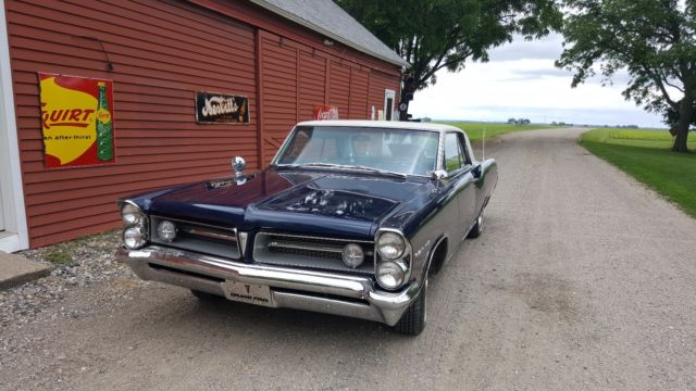 1963 blue body white vinyl top Pontiac Grand Prix Coupe