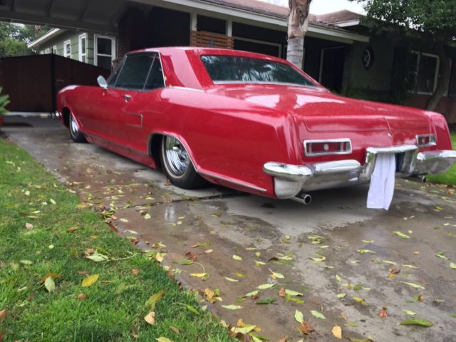 1963 Burgundy Buick Riviera Coupe