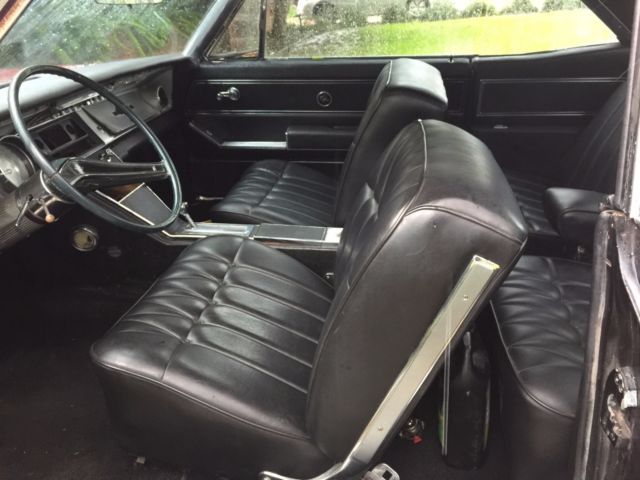 1963 Burgundy Buick Riviera Coupe