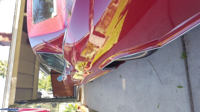 1963 Burgundy Buick Riviera Coupe