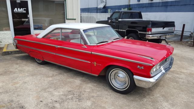 1963 red/white Ford Galaxie 2 door fast back