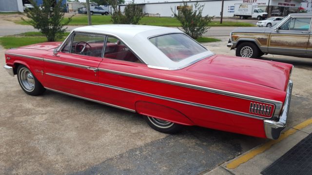 1963 red/white Ford Galaxie 2 door fast back