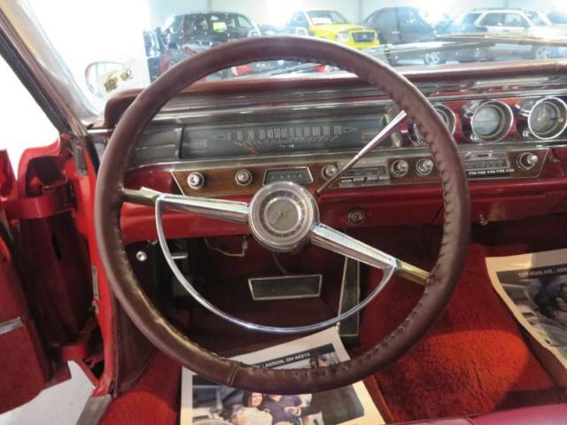 1963 Red Pontiac Bonneville --