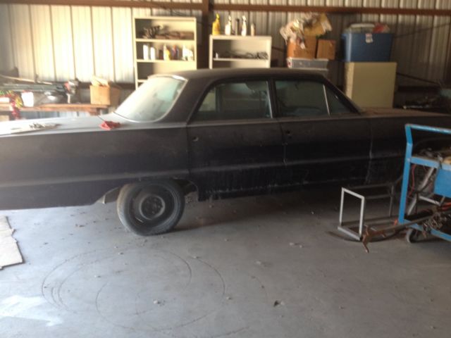 1964 teal blue Chevrolet Bel Air/150/210 sedan