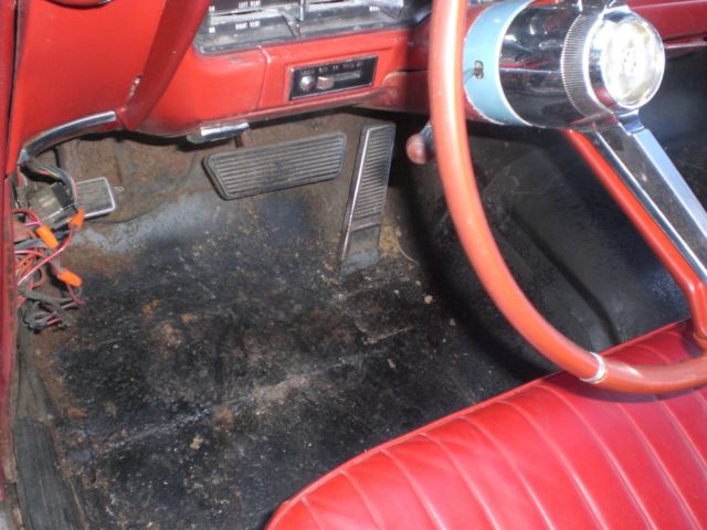 1964 Silver Cadillac DeVille Convertible