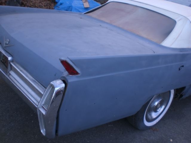 1964 Silver Cadillac DeVille Convertible