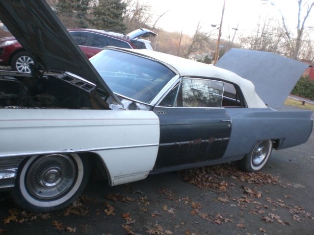 1964 Silver Cadillac DeVille Convertible
