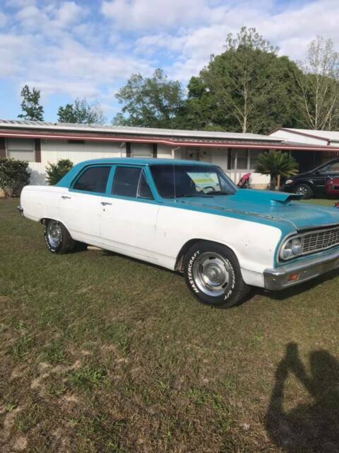 1964 blue/white Chevrolet Chevelle sedan