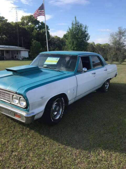 1964 blue/white Chevrolet Chevelle sedan