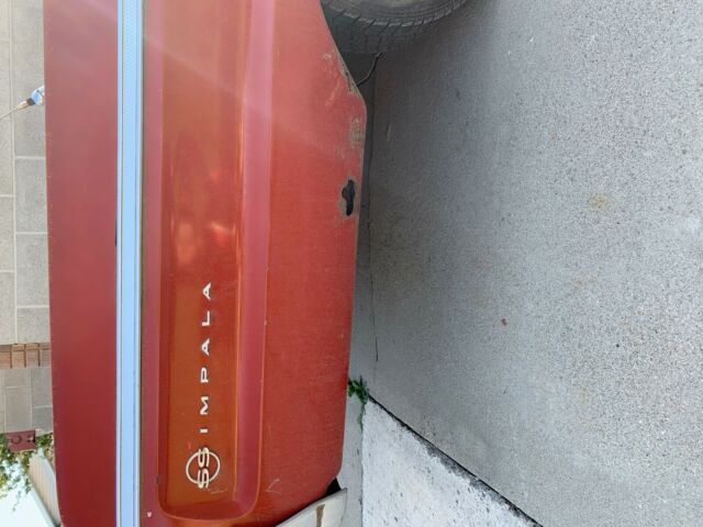 1964 Red Chevrolet Impala Coupe