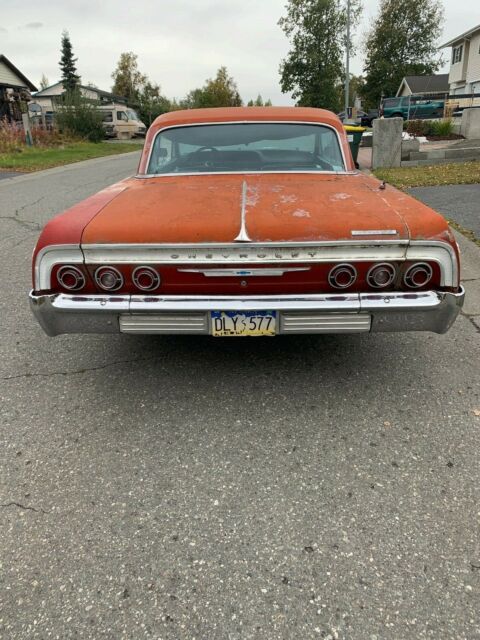 1964 Red Chevrolet Impala Coupe