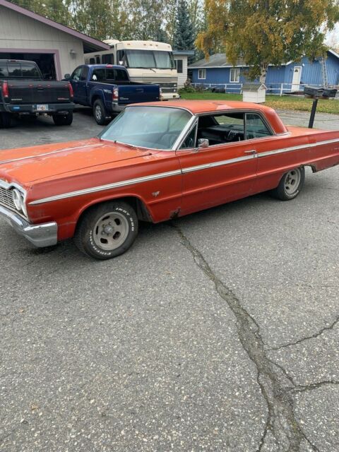 1964 Red Chevrolet Impala Coupe