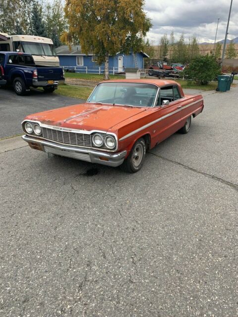 1964 Red Chevrolet Impala Coupe