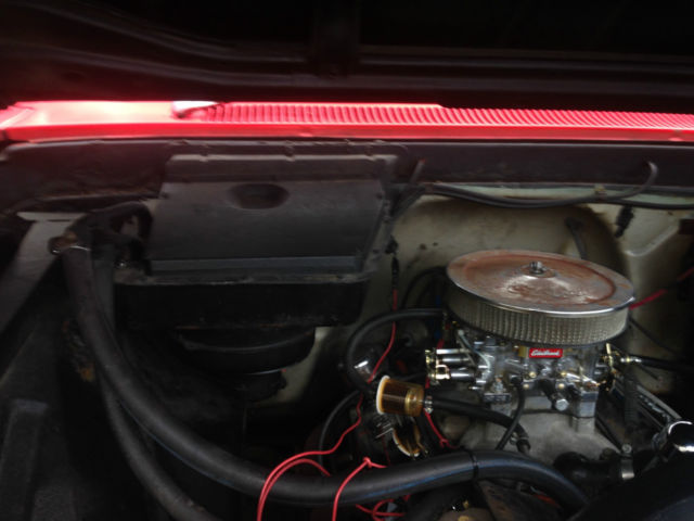 1964 red Chevrolet C-10 custom cab