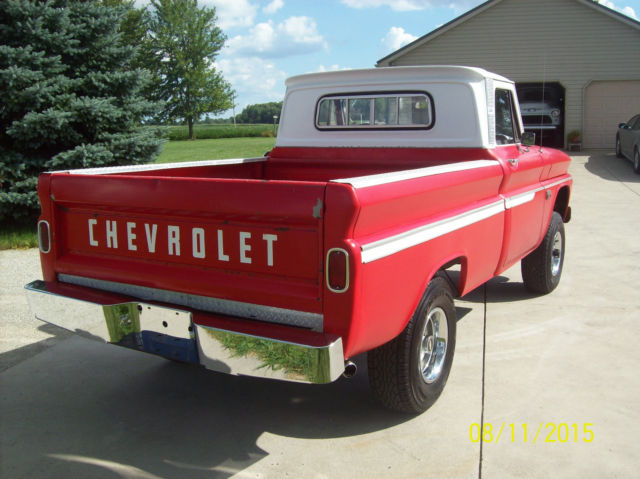1964 red Chevrolet C-10 custom cab