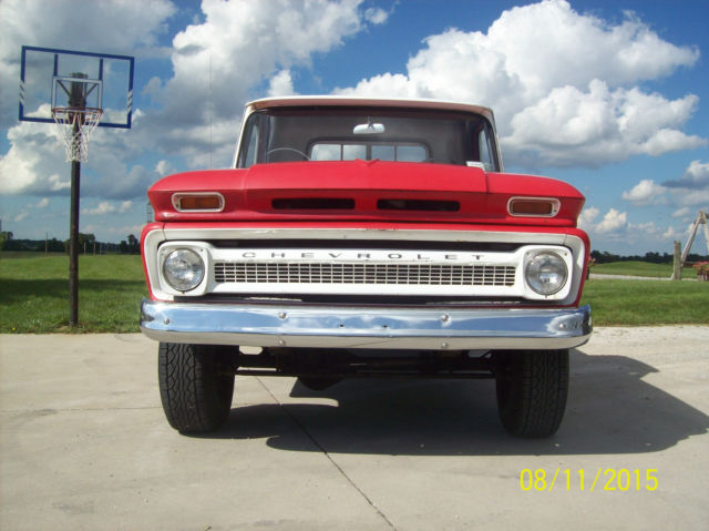 1964 red Chevrolet C-10 custom cab